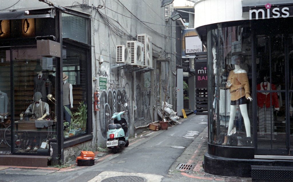 Lane with fancy shops in Taipei City.