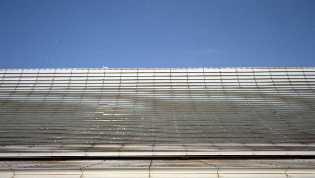 Photograph of the roof of terminal 1 Taoyouan International Airport Taiwan. Taken with Olympus 35DC camera using Kodak Vision 3 film.