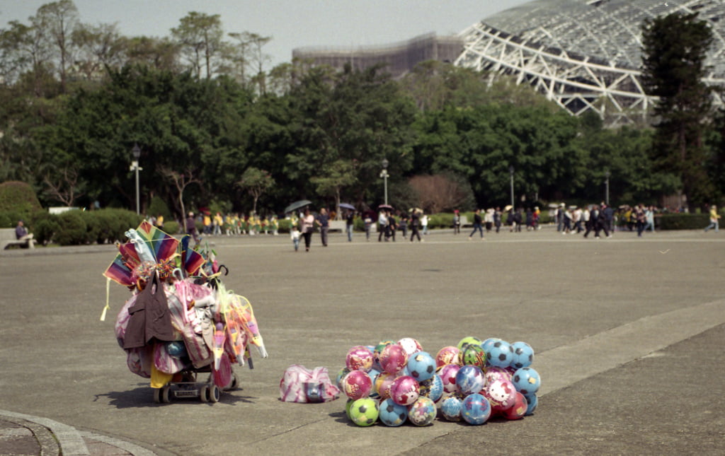 Vendor selling toys in front of Sun Yat-sen Memorial Hall in Taipei